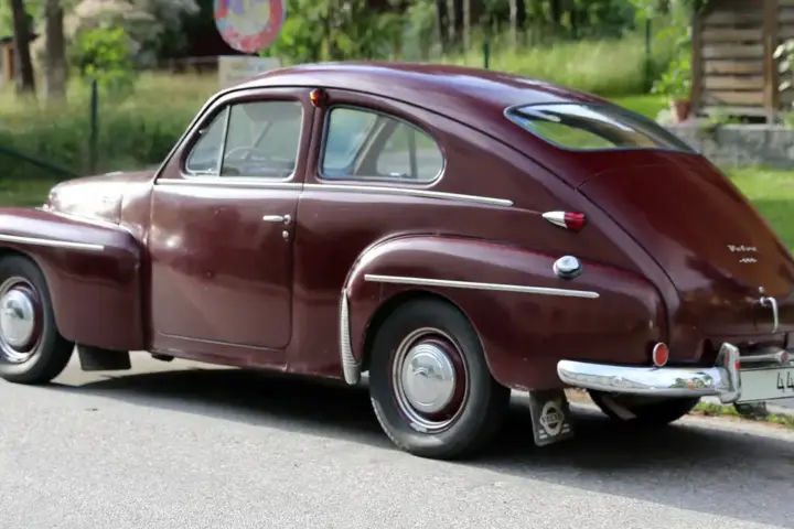 A modern Volvo car shown from the side on a road