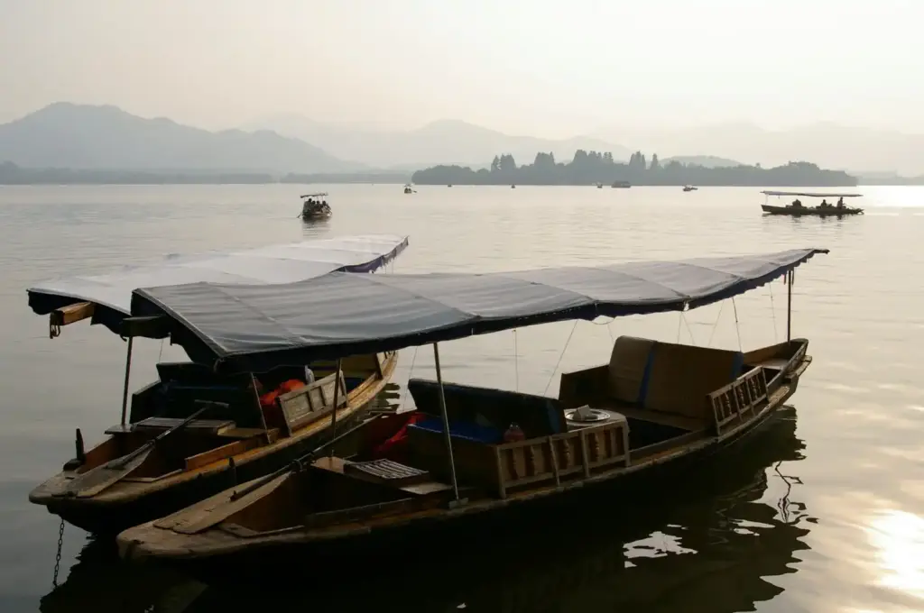 Boats on West Lake in Hangzhou before sunset