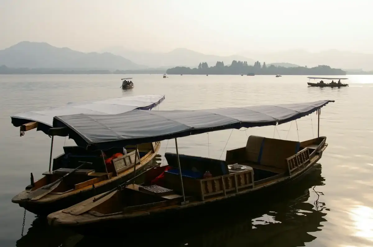 Boats on West Lake in Hangzhou before sunset