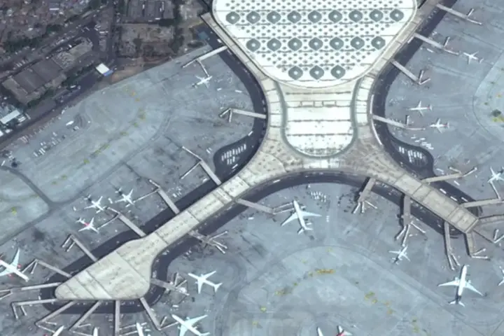 Aerial view of Mumbai Airport Terminal 2, where international flight operations are under discussion.
